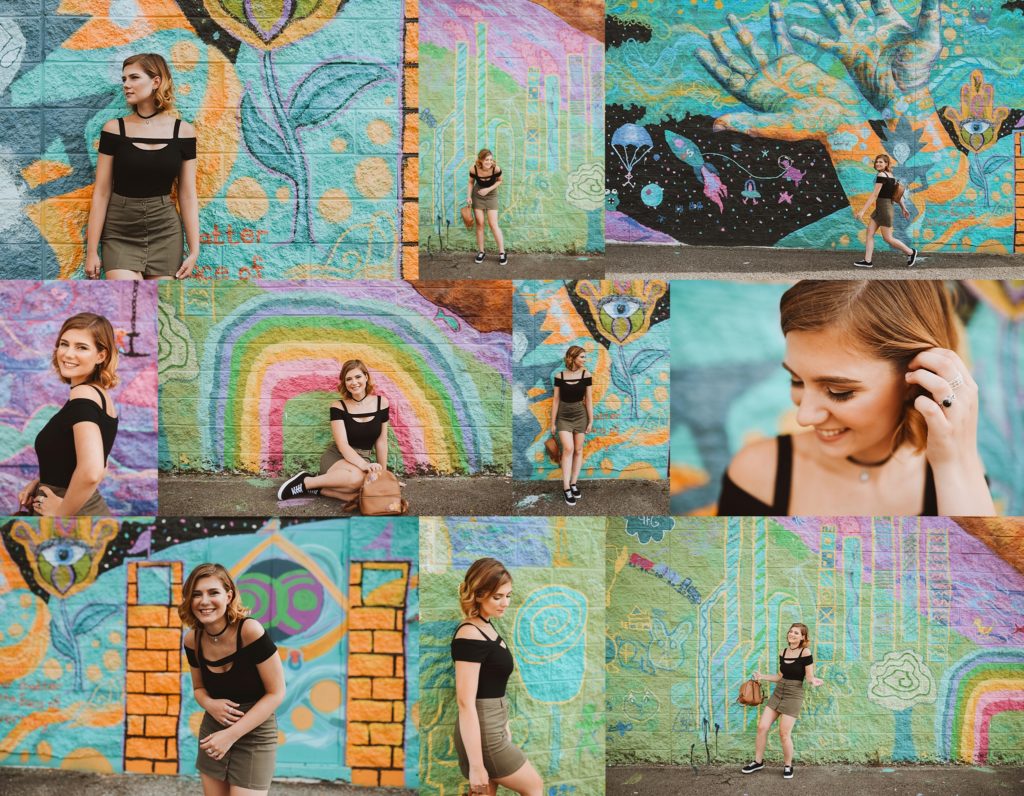 colorful mural in downtown sharon, pa with girl posing for senior photos