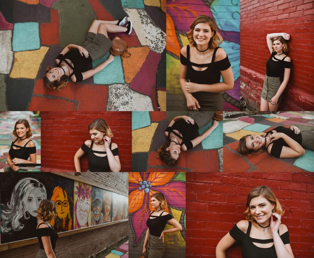 colorful mural wall in downtown sharon, pa with girl posing for senior photos